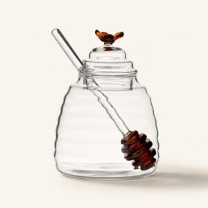 Pojemnik szklany na miód z łyżką 450 ml Pszczółka bursztynowy