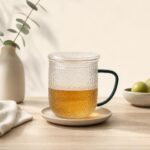 Kubek szklany z zaparzaczem i przykrywką 400 ml Jack bąbelkowa struktura zielony